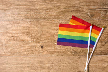 LGTB or rainbow flag. Gay pride flag on wooden table. Copyspaceの写真素材