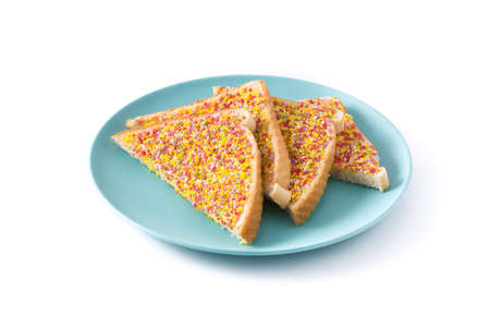 Traditional Australian fairy bread on plate isolated on white background