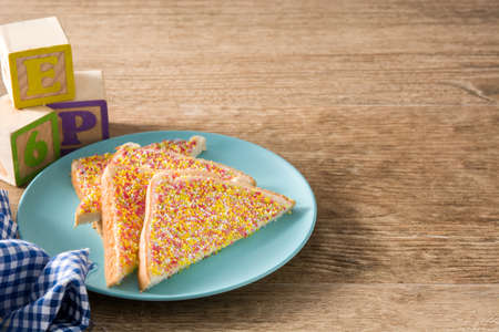 Traditional Australian fairy bread on wooden tableの写真素材