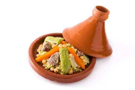 Traditional tajine with vegetables, chickpeas, meat and couscous isolated on white backgroundの写真素材