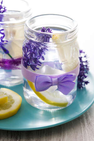 Lavender lemonade drink on white wooden table. Close upの写真素材