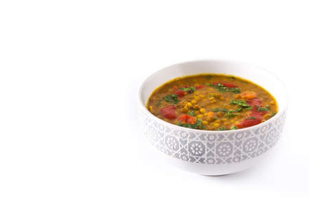 Indian lentil soup dal (dhal) in a bowl isolated on white background. Copyspaceの写真素材