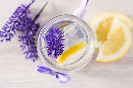 Lavender lemonade drink on white wooden table. Top viewの写真素材