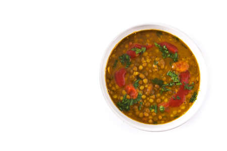Indian lentil soup dal (dhal) in a bowl isolated on white background. Top view. Copyspaceの写真素材