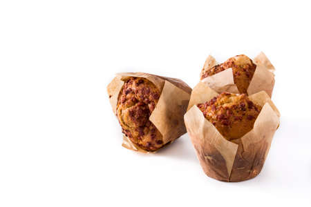 Apples and cinnamon muffins isolated on white background. Copyspace