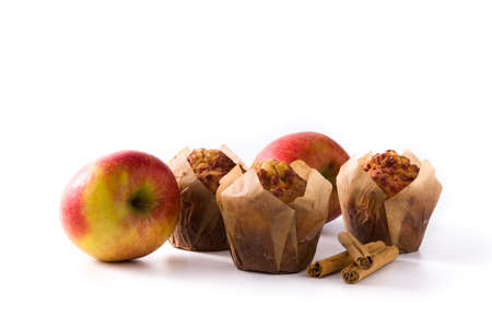 Apples and cinnamon muffins isolated on white backgroundの写真素材