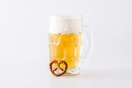 Oktoberfest beer in jar and pretzel isolated on white background.の写真素材