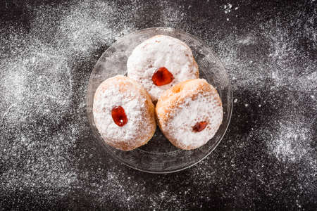 Hanukkah sufganiyot. Traditional Jewish donuts for Hanukkah.