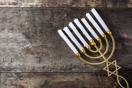 Jewish Hanukkah menorah on wooden table.Top view. Copy spaceの写真素材