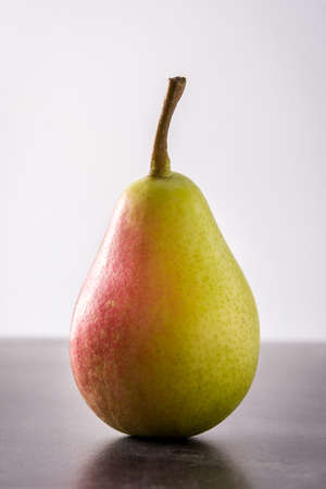 Healthy fresh pear on black background.の写真素材