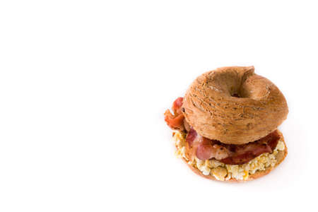 Bagel sandwich with bacon, egg and cheese isolated on white background. Copy spaceの写真素材