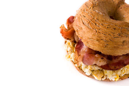Bagel sandwich with bacon, egg and cheese isolated on white background. Copy spaceの写真素材
