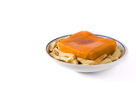 Typical Portuguese francesinha sandwich with french fries isolated on white background. Copy spaceの写真素材