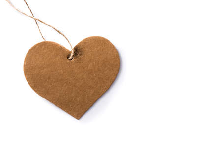 Brown heart-shaped label isolated on white background coy spaceの写真素材