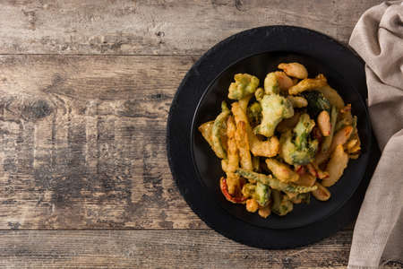 Japanese vegetable tempura on wooden backgroundの写真素材