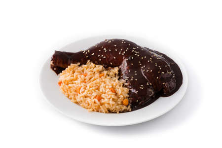 Traditional mole Poblano with rice isolated on white backgroundの写真素材