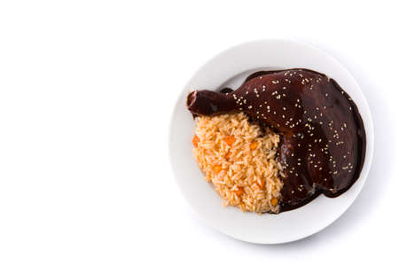 Traditional mole Poblano with rice plate isolated on white background.の写真素材