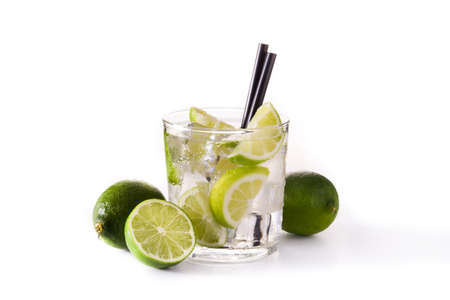 Caipiroska cocktail with lime isolated on white background