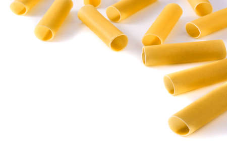 Uncooked cannelloni isolated on white background