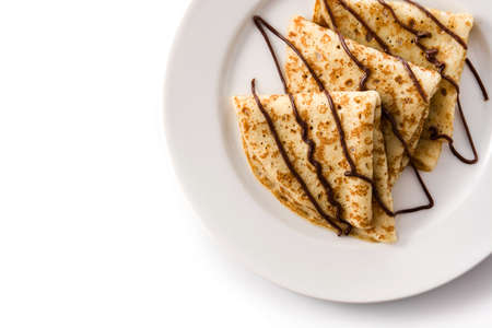 Sweet crepes with chocolate isolated on white backgroundの写真素材
