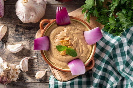 Gofio blanched in bowl on wooden table