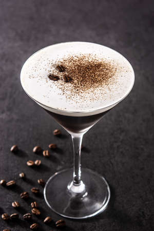 Martini espresso cocktail on black background