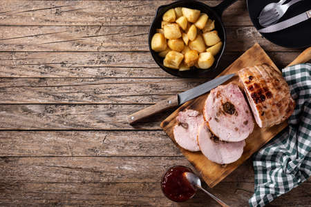 Stuffed chicken with nuts on rustic wooden tableの写真素材
