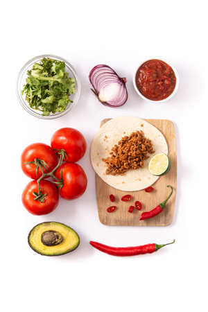 Mexican barquita taco with beef, chilli, tomato, onion and spices pattern on pink backgroundの写真素材