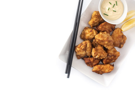 Spicy chicken karaage isolated on white background.の写真素材
