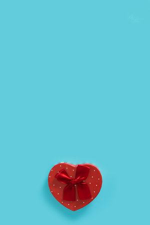 Heart shaped box on blue backgroundの写真素材