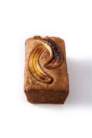 Homemade banana bread isolated on white backgroundの写真素材