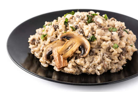 Risotto with mushroom isolated on white backgroundの写真素材