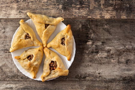 Traditional middle eastern fatayer on wooden tableの写真素材