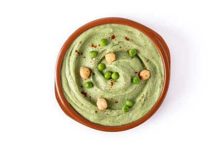 Green pea hummus isolated on white backgroundの写真素材