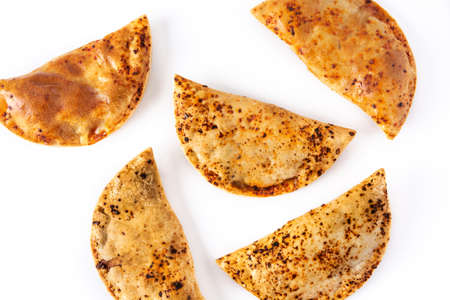 Traditional Chilean empanadas isolated on white backgroundの写真素材