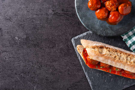 Meatball sub sandwich on black slate backgroundの写真素材