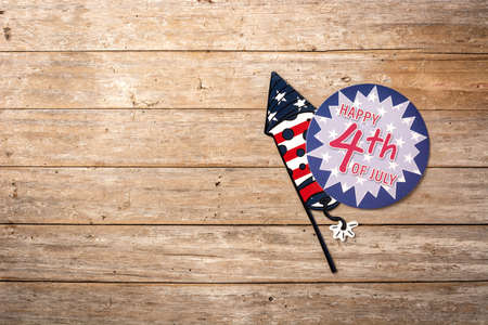 Happy 4th July ornament on wooden backgroundの写真素材