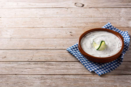 Traditional Greek Tzatziki on wooden tableの写真素材