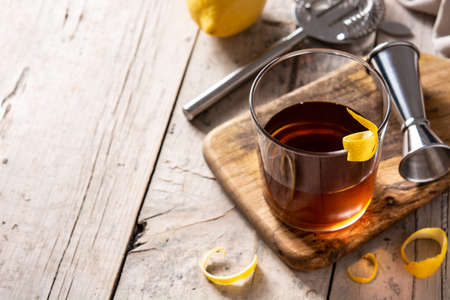 New Orleans sazerac cocktail on rustic wooden tableの写真素材
