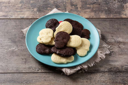 Chocolate Mexican skulls on wooden tableの写真素材