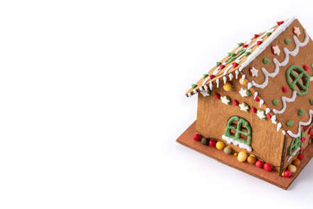 Christmas gingerbread house isolated on white backgroundの写真素材