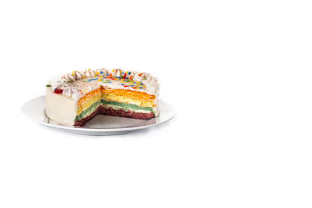 Rainbow layer cake isolated on white backgroundの写真素材
