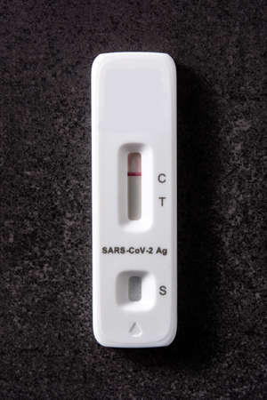 Rapid antigen test on black background