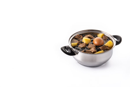 Traditional Jewish cholent isolated on white background. Hamin.の写真素材