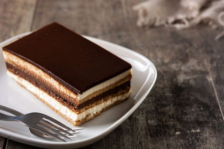 Opera cake dessert on wooden tableの写真素材