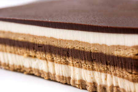 Opera cake dessert isolated on white backgroundの写真素材