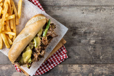 Philly cheese steak sandwich on wooden tableの写真素材