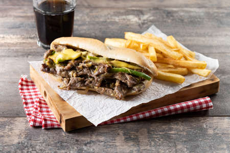 Philly cheesesteak sandwich on wooden tableの写真素材