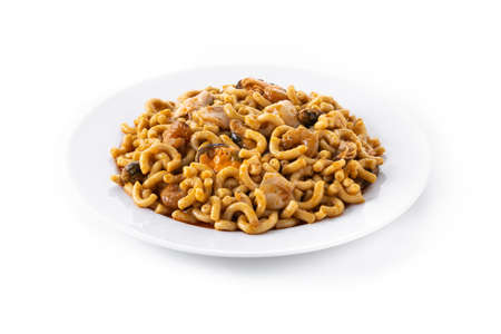 Traditional Spanish fideua. Noodle paella isolated on white background.の写真素材