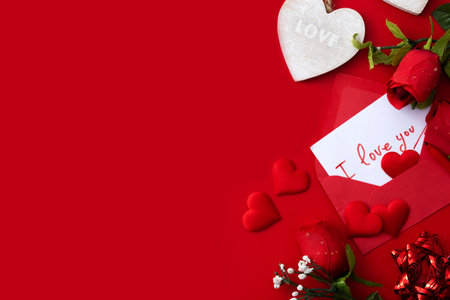 Note that it says "I love you" inside an envelope with hearts and roses. Copyspace.の写真素材